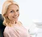 Woman smiling in the dental chair